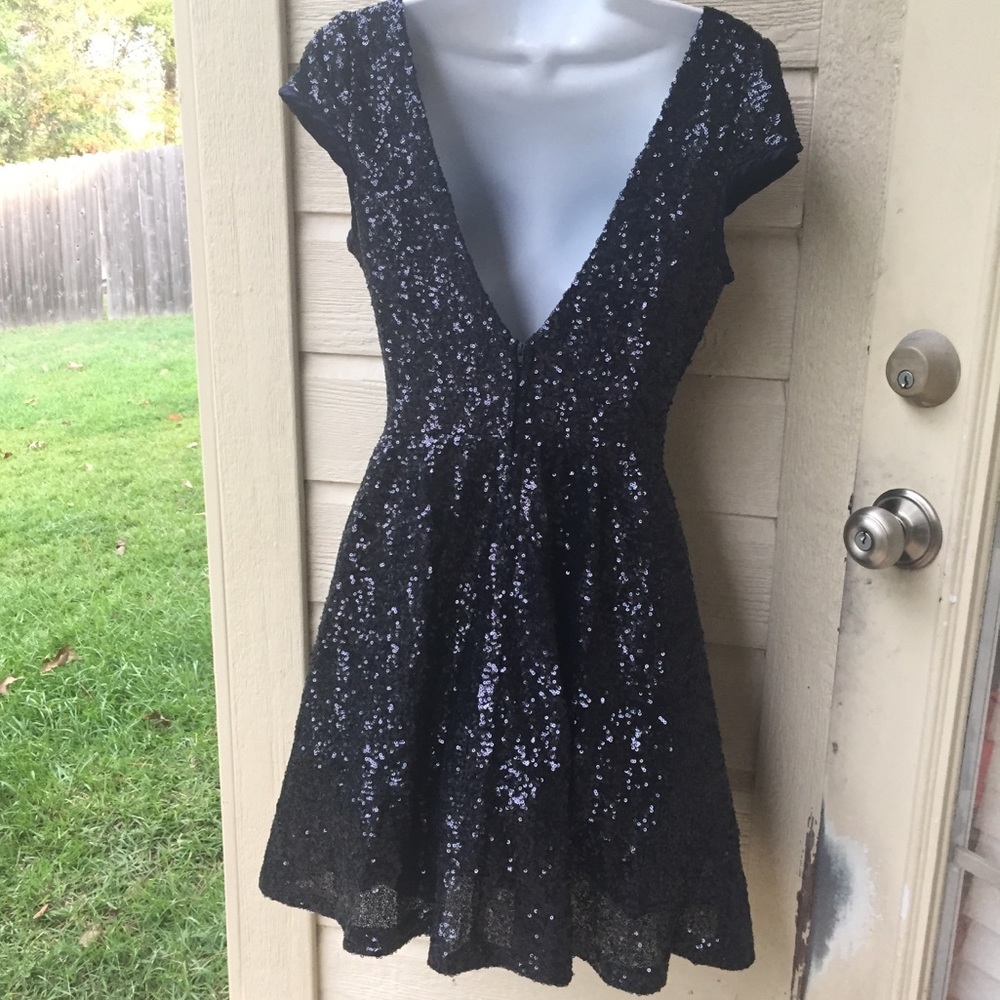 B.  Darling  navy micro sequin fit and flair